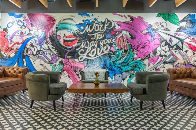 coworking space with a colorful wall mural