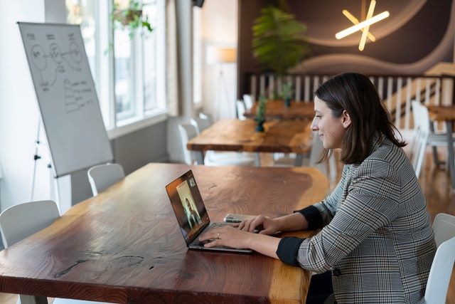 remote coaching and mentoring through video call in a coworking space