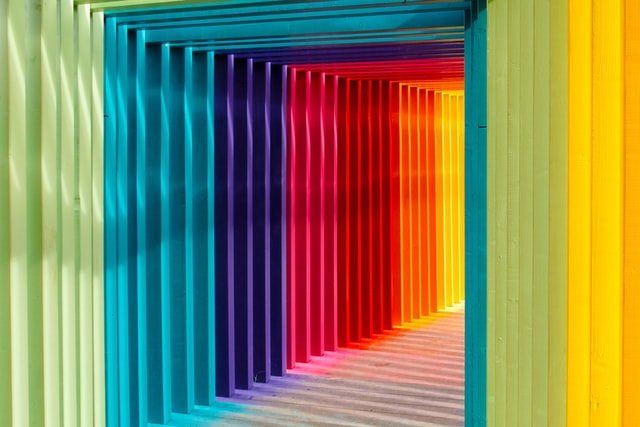 rainbow color painted hallway tunnel
