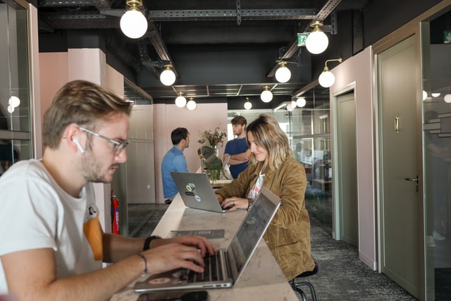 working with others in a coworking space while working individually